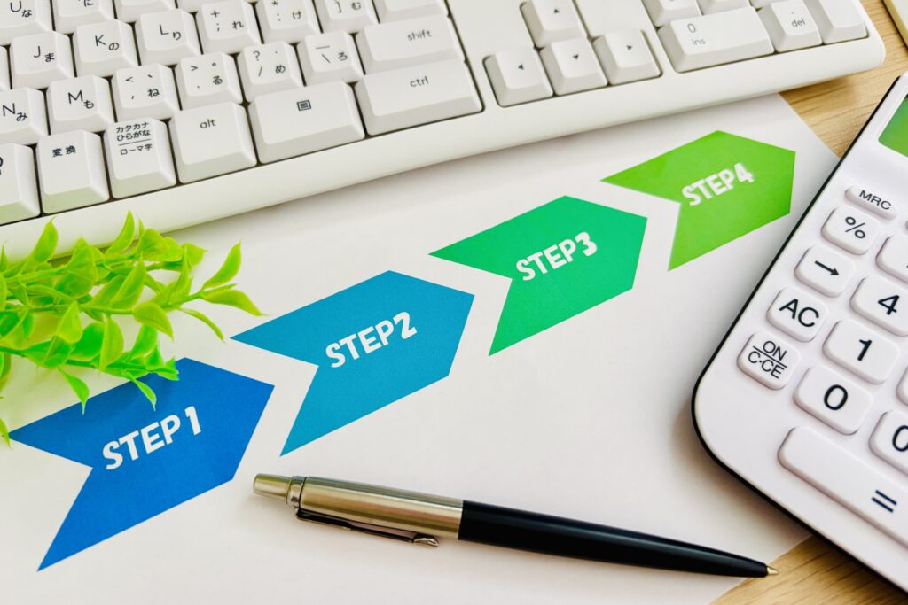 STEP1からSTEP4が紙に書かれている画像